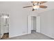 Bedroom featuring an ensuite bathroom and closet with doors open at 125 Sandridge Ct, Alpharetta, GA 30022