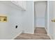 Bright Laundry room with wood floors at 125 Sandridge Ct, Alpharetta, GA 30022