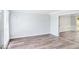 Bright living room with wood floors and glass doors at 125 Sandridge Ct, Alpharetta, GA 30022