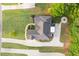 An aerial view shows a private residence with a long driveway and green lawn at 150 Rose Creek Dr, Covington, GA 30014