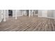Expansive finished basement featuring stylish floors, white trim, and versatile layout at 150 Rose Creek Dr, Covington, GA 30014