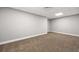 This carpeted bedroom has a white ceiling with inset lighting at 150 Rose Creek Dr, Covington, GA 30014