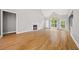Living area features a fireplace, vaulted ceilings, and access to a patio at 150 Rose Creek Dr, Covington, GA 30014