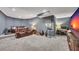 Basement entertainment area with reclining sofas, instruments and a large screen at 320 Ironhill Trce, Woodstock, GA 30189