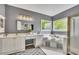 Stylish bathroom featuring a double vanity, soaking tub, and glass shower at 320 Ironhill Trce, Woodstock, GA 30189