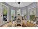 Charming breakfast nook with natural light and a view to the backyard at 320 Ironhill Trce, Woodstock, GA 30189