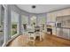 Breakfast nook with lots of natural light, and stainless steel refrigerator at 320 Ironhill Trce, Woodstock, GA 30189