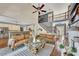 Spacious living room with staircase, modern decor, and plenty of natural light at 320 Ironhill Trce, Woodstock, GA 30189