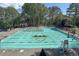 A large pool with lap lanes, lounge chairs, umbrellas, and a nearby gazebo for relaxation at 320 Ironhill Trce, Woodstock, GA 30189