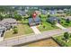 Aerial view of a well-manicured two-story home highlighting its landscaping and neighborhood at 321 Shannon Ct, Mcdonough, GA 30252