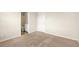 Bedroom featuring neutral carpeting with an en suite bathroom at 321 Shannon Ct, Mcdonough, GA 30252