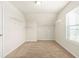 Walk-in closet with built-in shelving and a window, providing ample storage space and natural light at 321 Shannon Ct, Mcdonough, GA 30252