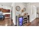 An elegant bar area with a wine cooler and stylish decor at 3302 Avenel Ct, Snellville, GA 30078