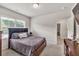 Bedroom featuring neutral paint, carpet, and a queen bed at 3302 Avenel Ct, Snellville, GA 30078