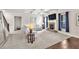 Bright living room with fireplace, coffered ceiling and comfortable seating area at 3302 Avenel Ct, Snellville, GA 30078