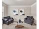 Comfortable sitting area with stylish decor and soft carpeting at 3302 Avenel Ct, Snellville, GA 30078