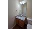 Charming half-bathroom with granite countertop and modern fixtures at 4677 Liberty Square Dr, Acworth, GA 30101