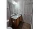 A modern half-bathroom featuring granite counters, new fixtures, and modern finishes at 4677 Liberty Square Dr, Acworth, GA 30101