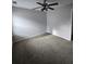 Cozy bedroom features neutral walls and an updated ceiling fan with lights at 4677 Liberty Square Dr, Acworth, GA 30101