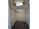 Organized walk-in closet with carpeted floors and multiple shelves for maximum storage space at 4677 Liberty Square Dr, Acworth, GA 30101