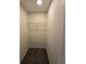Walk in closet with shelving and carpet at 4677 Liberty Square Dr, Acworth, GA 30101