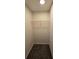 Walk-in closet with white wire shelving for optimal storage solutions at 4677 Liberty Square Dr, Acworth, GA 30101