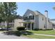 Well-maintained two-story home with vinyl siding, a cozy front porch, and manicured lawn in a neighborhood at 4677 Liberty Square Dr, Acworth, GA 30101