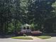Quaint gazebo set amidst lush greenery, offering a serene and picturesque outdoor retreat at 4677 Liberty Square Dr, Acworth, GA 30101