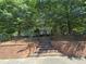 Charming community gazebo with brick staircase nestled among mature trees and lush greenery at 4677 Liberty Square Dr, Acworth, GA 30101