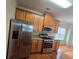 Spacious kitchen with stainless steel appliances and plenty of cabinet storage at 4677 Liberty Square Dr, Acworth, GA 30101