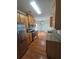Well-lit kitchen featuring stainless steel appliances, granite countertops, and hardwood floors at 4677 Liberty Square Dr, Acworth, GA 30101