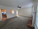 Spacious living room featuring a cozy brick fireplace and lots of natural light at 4677 Liberty Square Dr, Acworth, GA 30101