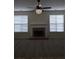 A spacious living room with neutral carpeting and a brick fireplace at 4677 Liberty Square Dr, Acworth, GA 30101