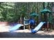 A colorful playground with slides and play equipment nestled in a wooded area at 4677 Liberty Square Dr, Acworth, GA 30101