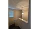 The staircase features neutral paint and a modern light fixture at 4677 Liberty Square Dr, Acworth, GA 30101