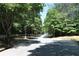 Quiet, tree-lined street in a residential neighborhood at 4677 Liberty Square Dr, Acworth, GA 30101