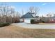 Spacious home featuring a side-entry garage and large lot with a sprawling driveway at 816 Ivy Ridge Dr, Loganville, GA 30052