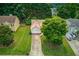 An aerial view of a well-manicured lawn and a charming single-Gathering home at 965 Under Ct, Sugar Hill, GA 30518