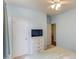 Spacious bedroom featuring a chest of drawers and a ceiling fan at 965 Under Ct, Sugar Hill, GA 30518