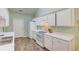 Kitchen with appliances, ample counter space, and neutral flooring at 965 Under Ct, Sugar Hill, GA 30518