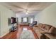 Spacious living room with hardwood floors and ample seating at 965 Under Ct, Sugar Hill, GA 30518