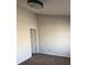 Neutral bedroom featuring a ceiling fan and plush carpet, ready for personalization at 1843 Grove Way, Hampton, GA 30228