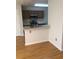 Modern kitchen with stainless steel appliances and a breakfast bar, perfect for casual dining at 1843 Grove Way, Hampton, GA 30228