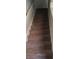 Carpeted staircase leading to the upper level of the home, providing a comfortable and safe transition at 1843 Grove Way, Hampton, GA 30228