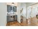 Chic bar area with custom cabinetry, wine storage, and stylish decor, ideal for entertaining guests at 2313 Saint Davids Nw Sq # 12, Kennesaw, GA 30152