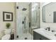 Modern bathroom features a stylish walk-in shower with sleek fixtures and contemporary design elements at 2313 Saint Davids Nw Sq # 12, Kennesaw, GA 30152