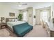 Cozy bedroom with natural light, neutral colors, and comfortable furnishings at 2313 Saint Davids Nw Sq # 12, Kennesaw, GA 30152