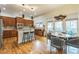 Well-appointed kitchen with stainless steel appliances, a breakfast bar, and adjacent dining area at 2313 Saint Davids Nw Sq # 12, Kennesaw, GA 30152
