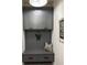 Mudroom boasts custom gray cabinets, bench seating with drawers, and decor, perfect for organization at 2313 Saint Davids Nw Sq # 12, Kennesaw, GA 30152