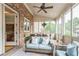 Relaxing screened porch featuring comfortable seating and ceiling fan at 2313 Saint Davids Nw Sq # 12, Kennesaw, GA 30152